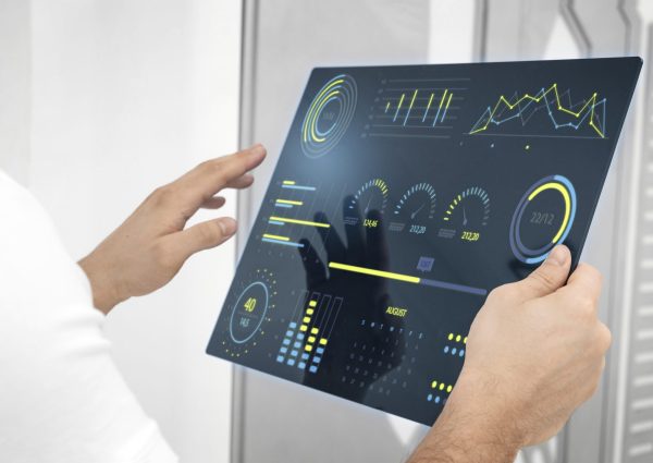 close-up-hand-holding-futuristic-screen